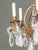 Maria Theresa Style Eight-Branch Gilt Bronze and Rock Crystal Chandelier. 44.5" H x 26.5" Diameter. Provenance: From a...