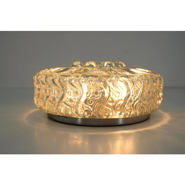 Midcentury design wall or ceiling lamp, flush mount, 1970s, very nice style of lighting. This piece is attributed to the...