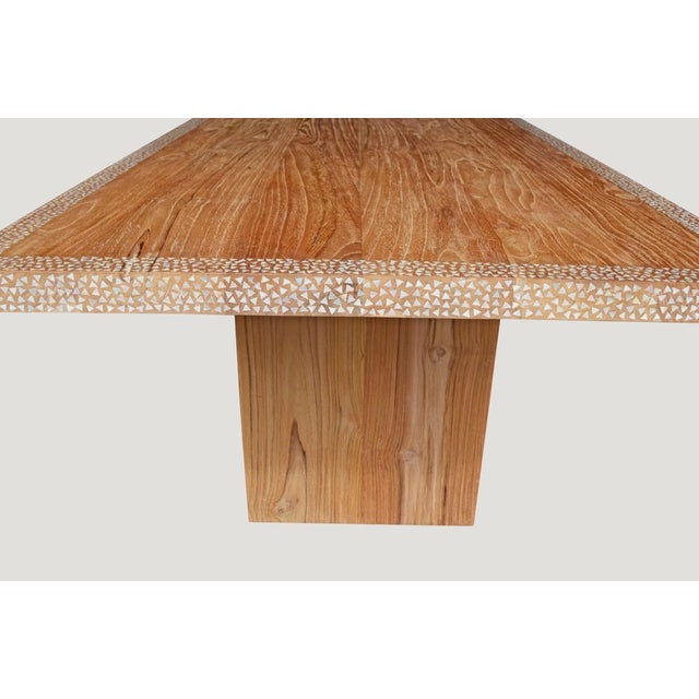 Reclaimed teak wood with added shell inlay on the top and edge, floating on modern L style base. Perfect for inside or...