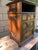 Here we have a very handsome antique carved Jacobean style side table or liquor cabinet. This one is made by Kittinger in...