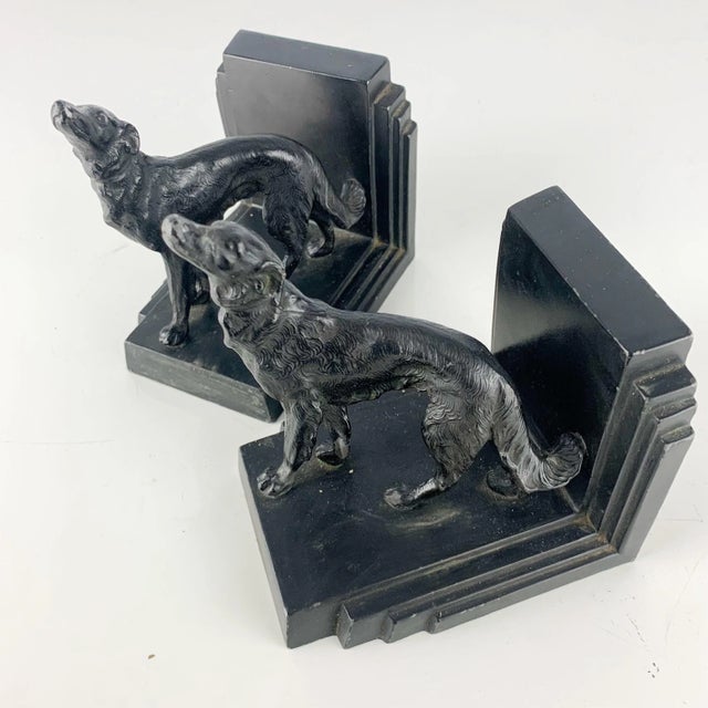 Incredible vintage cast metal Ronson bookends with detailed dogs. Incredible art deco feel and details. Love the lines....