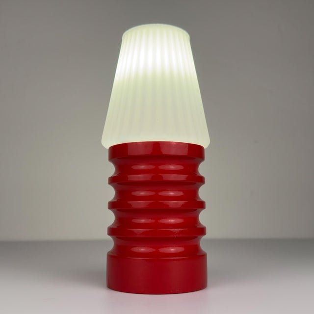 Beautiful vintage table lamp made in italy in the 1970s. Wood and glass. the lamp is in good vintage condition....