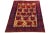 This hand-knotted Persian wool rug has a tan field with accents in red and blue all over the floral design. This rug...