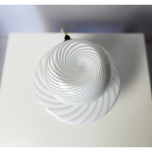 Elegant white mushroom lamp in Murano glass. White opal glass, hand-blown in a single piece. The swirl pattern does two...
