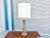 An exquisite statement piece of mid-century lighting design, this vintage table lamp was designed by Gerald Thurston for...