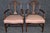 This is a superb, expertly carved mahogany plume back chairs from England. They backs are beautifully carved with the...