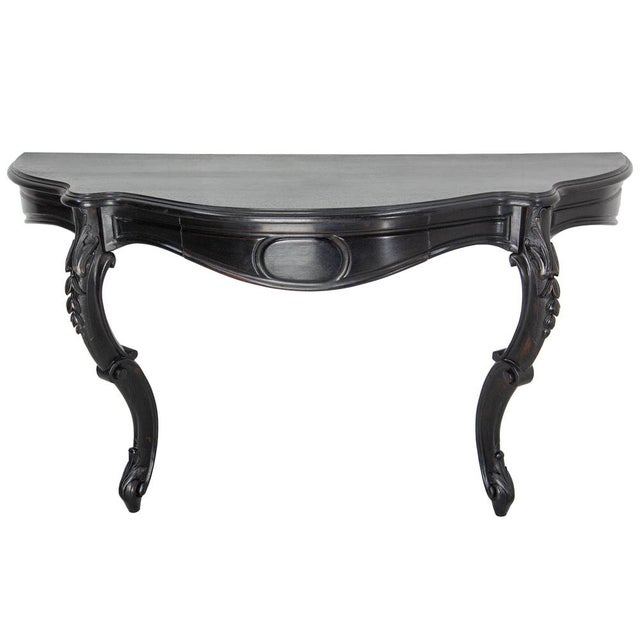 French Napoleon III wall console made circa 1880. It was made from an original wood dining table which has been...