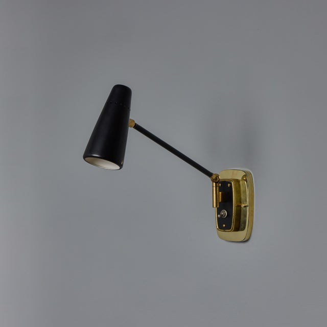 Mid-Century Modern 1950s Stilnovo Perforated Black Metal and Brass Sconce With Stamped Label For Sale - Image 3 of 17
