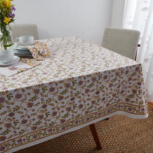 The Gina design displays a classic Indian floral vine pattern in lilac, green and gold. Our versatile Indian block print...