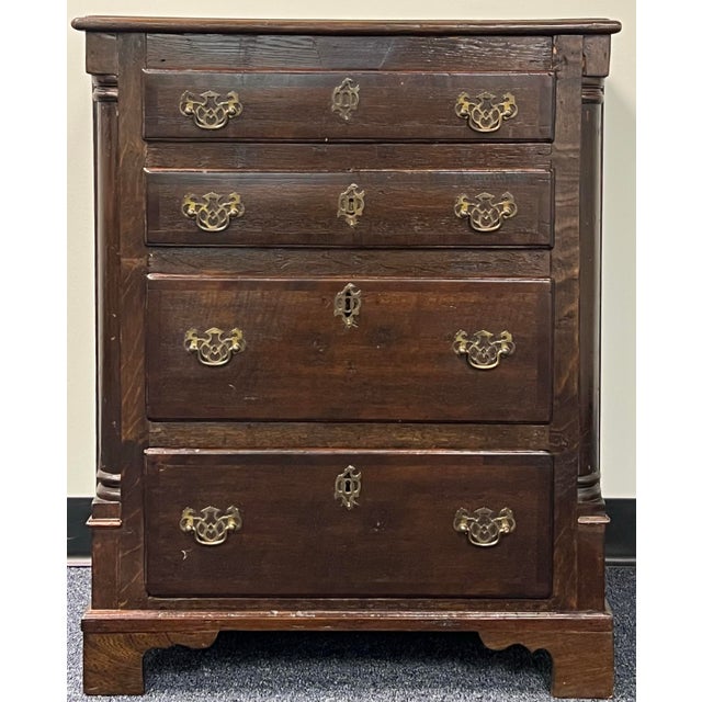 Mid 18th century Georgian oak 4 drawer bachelors chest. Crafted in quarter sawn oak with dovetailed drawers and original...