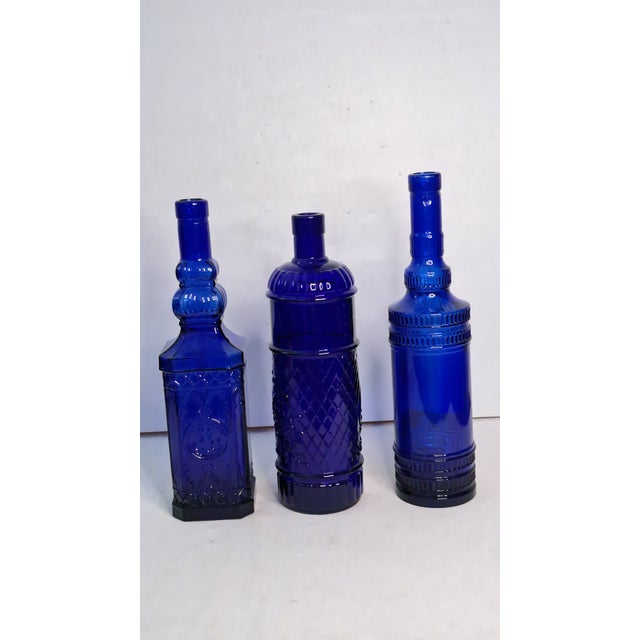 Mid-Century Modern Vintage Cobalt Blue Glass Bottle Vase Lot of 3 Decorative Embossed Glass 12" For Sale - Image 3 of 11