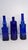 Mid-Century Modern Vintage Cobalt Blue Glass Bottle Vase Lot of 3 Decorative Embossed Glass 12" For Sale - Image 3 of 11