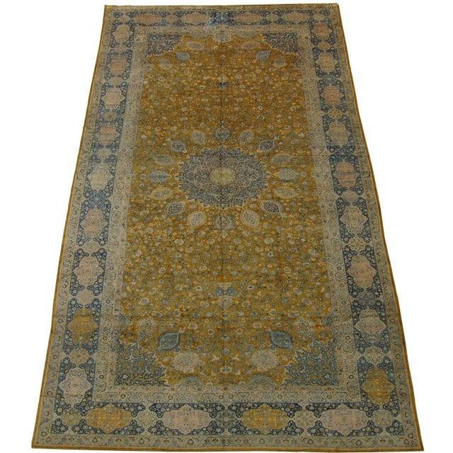 This magnificent circa 1900 Tabriz palace carpet represents an ambitious marriage of scale, symmetry, and extraordinarily...