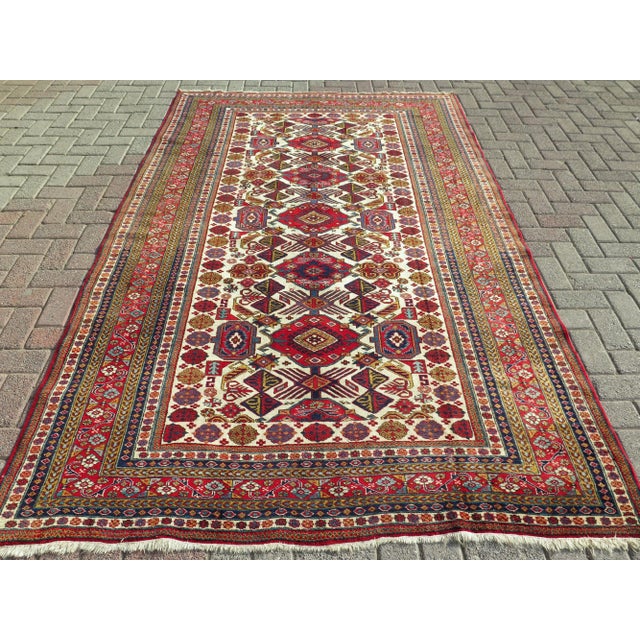 The Carpet Rug you are about to purchase is a Vintage Handmade Turkish Rug that is considered a collection piece due to...