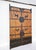 This pair of antique screen door panels showcase a blend of rustic pinewood and hand-forged artwork. Adorned with...