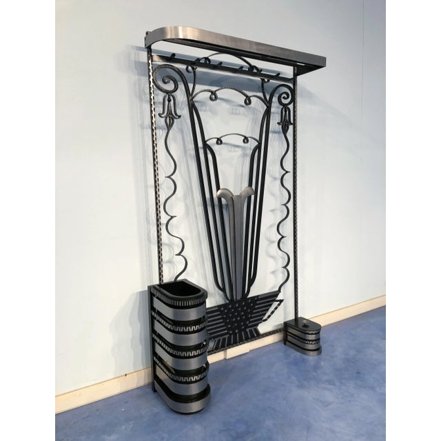 This is a gorgeous French Art Deco clothes hanger or coat rack with a unique design that combines the lower part,...