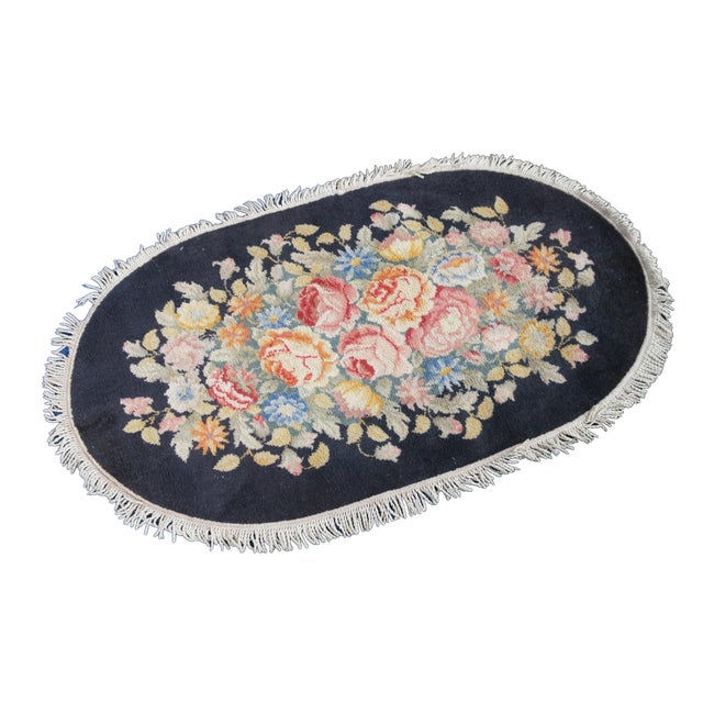 Vintage Karastan Decorette Floral boquet area rug / carpet / mat featuring oval form with floral design and fringe....