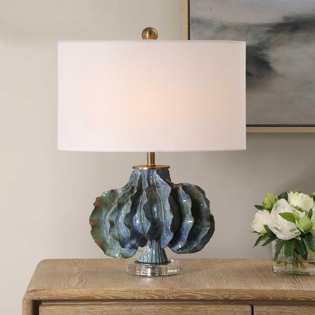 This Table Lamp Features A Distinctive, Organically Shaped Ceramic Base, Covered In A Nuanced Glaze In Hues Of Blue,...