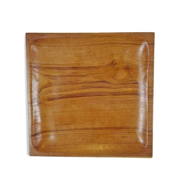 Simple teak wood square plate. Each slightly unique in grain and each sold individually.