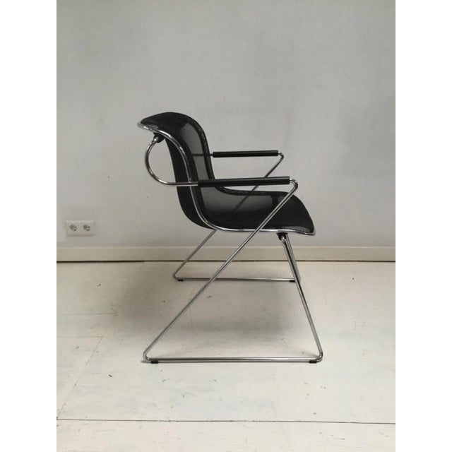 This Penelope armchair was designed in 1982 by Charles Pollock and produced by Castelli in Italy. The frame of this chair...