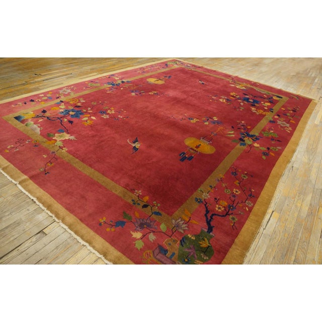 Antique Art Deco Room Size Wool Red Rug, Circa Date: 1920s. This exceptional example of antique rugs captures the...
