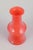 Swedish art glass Mouth-blown vase, 1970s. Mouth-blown vase in vivid orange glass with an elegant cylindrical body and...