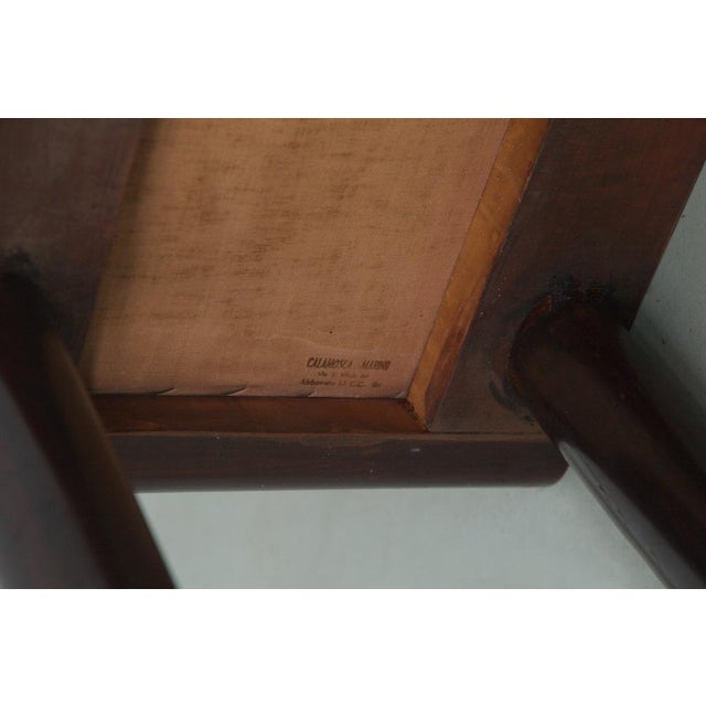 The satin is in excellent condition even though it is from the period. This piece is attributed to the mentioned...