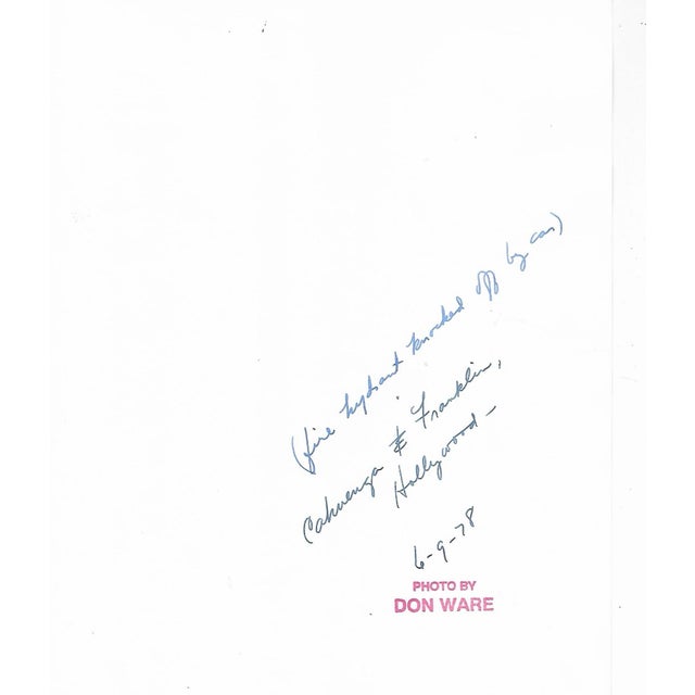 1979 black and white photo by Don Coleman Ware (1921-2006) of a car that hit a fire hydrant and the resulting water spout....