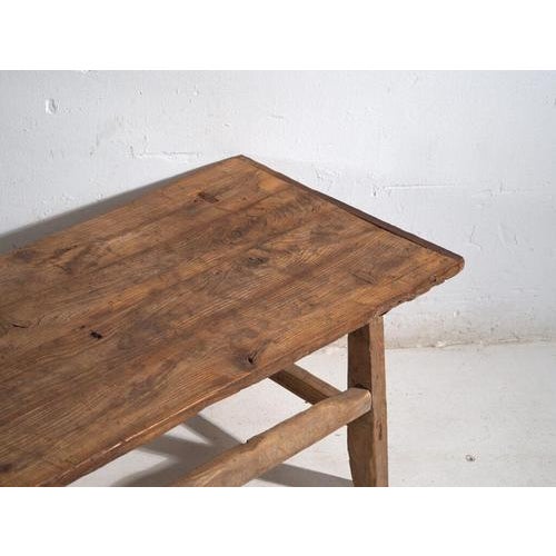 Antique low table in pine wood, traditional chinese furniture originating from northern china and dated circa 1930....