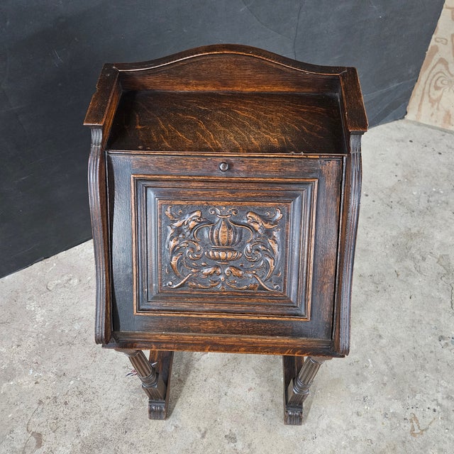 This a very unique Antique Oak Secretary/Bureau/Lecturn With Carved Front Fall on Turned Leg Base. It is a nice compact...