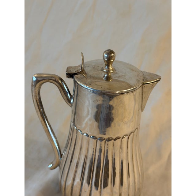 Early 20th century German 900 silver coffee pot featuring a classic form and balanced proportions. A refined piece...