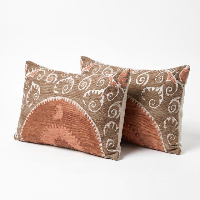 This beautiful 17'' x 30'' hand-embroidered Suzani pillow cover set was made from authentic Uzbek cotton fabric. The...