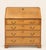 A handsome late 18th-century English Georgian slant-front bureau crafted in pine, retaining a wonderfully warm, mellow...