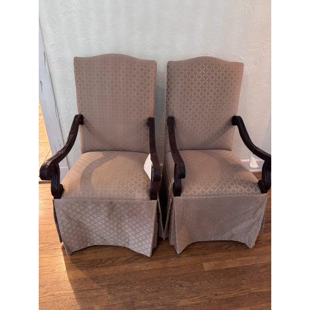 Antique mahogany-armed dining head chairs. Impeccably well kept. A gift from my grandmother but they don't fit under my...