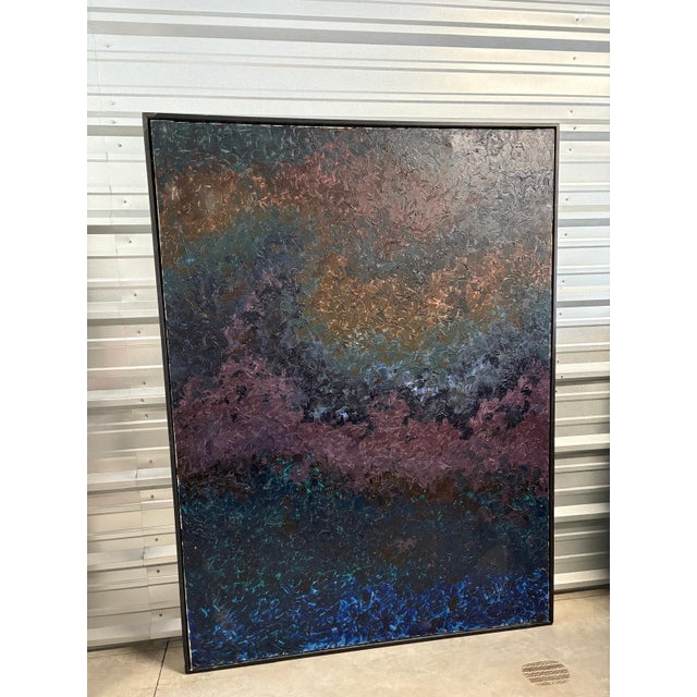 This striking large-scale abstract painting features deep, richly layered impasto textures in a moody palette of blues,...
