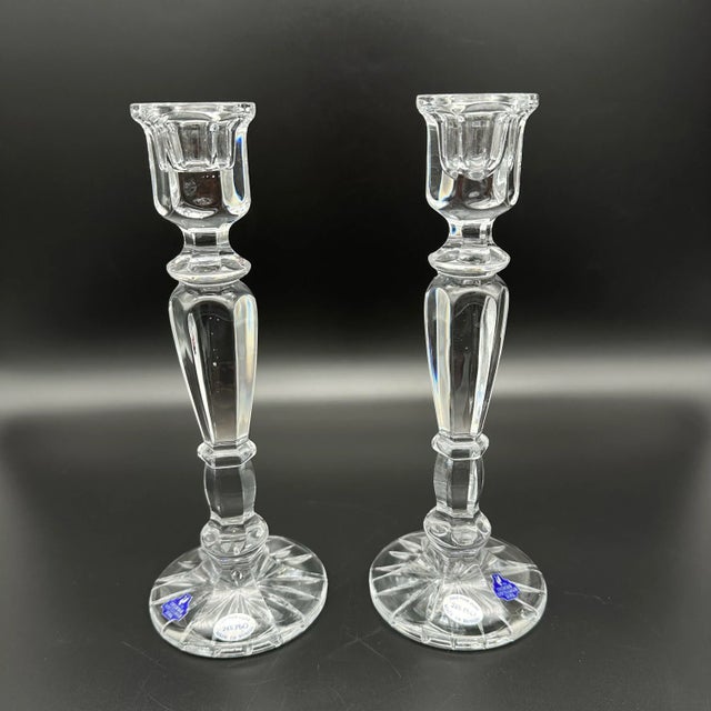 Add a touch of elegance and sophistication to any room with these vintage crystal candlestick holders. Handmade with care...