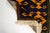 This is a vintage Turkish Oushak rug from the Mid 20th Century. The piece was hand-knotted.