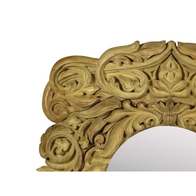 A Mid 20th-C. Southeast Asian bleached mahogany mirror. Features expertly carved details.