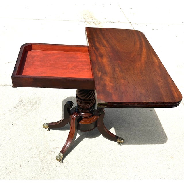 Traditional Antique Flame Mahogany, Regency-Style, Flip-Top, Rotating, Game Table, W/Hidden Drawer, Carved Pedestal, Brass Claws and Casters. C1810 to 1820 For Sale - Image 3 of 12