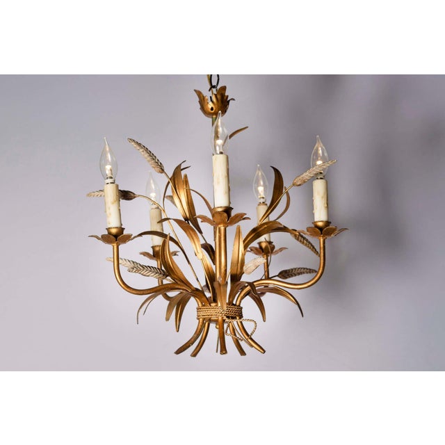 This stunning 20th-century French chandelier, inspired by the timeless elegance of Coco Chanel, beautifully blends vintage...