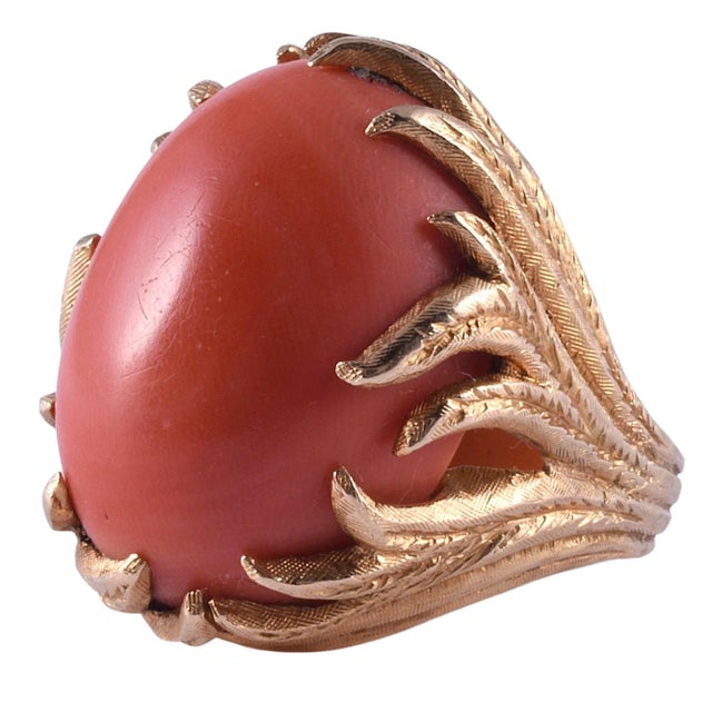 This is part of Chairish’s Fine Jewelry assortment. Vintage oval coral ring in hand engraved setting, circa 1970. This...