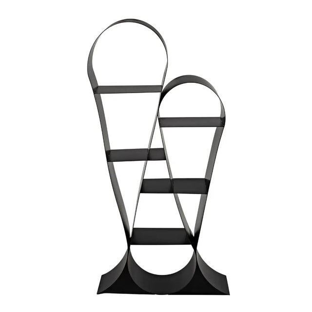 Crafted in matte black finished metal, this statement bookcase suggests massive ribbons or loops in repetition. Its pared...