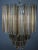 An exceptional rare Murano glass chandelier consisting of two different types of glass. Cognac-colored triangular rods and...