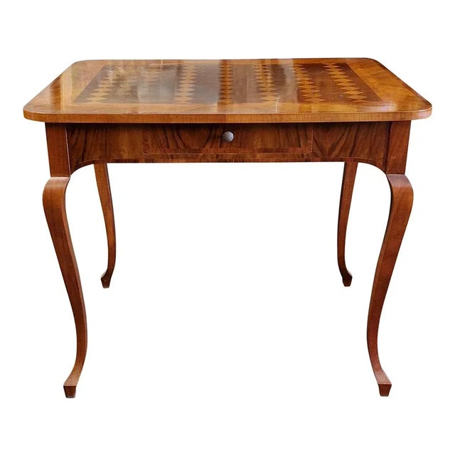 Louis XV style coffee table in walnut with inlaid top supported by wavy legs, in the under-top band there is a drawer....