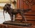 Decorate a man's office or library with this elegant heavy dog and bird sculpture! Created in France circa 2000 and...