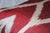Bohemian silk ikat pillow with vibrant colors of red, beige . Super hand soft. Pillow has a zipper for closure. Insert is...