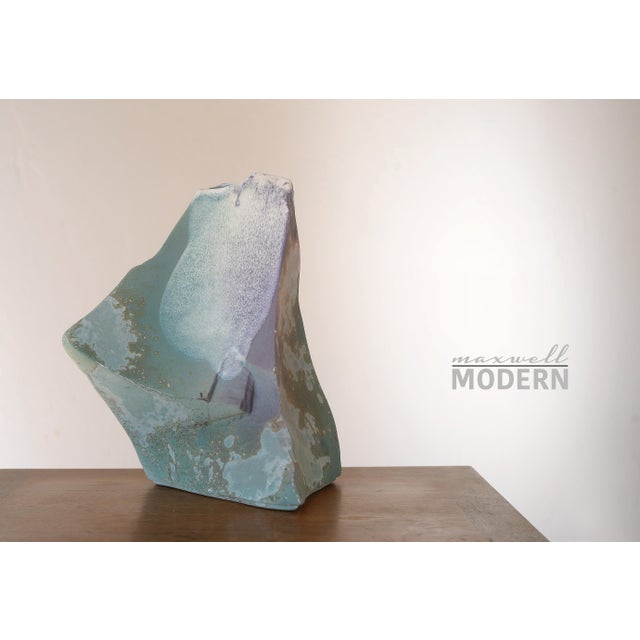 Incredible piece of vintage pottery from Tony Evans! This monumental vase is nothing less than spectacular from every...