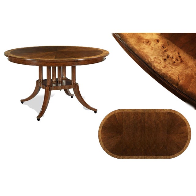 54-inch round-to-oval dining room table with a walnut radial-cut field and burly walnut border. This table includes two...
