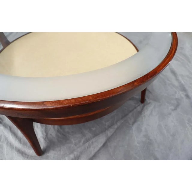 The lower table measures 71cm. diameter. This piece has an attribution mark, I am sure that it is completely authentic and...