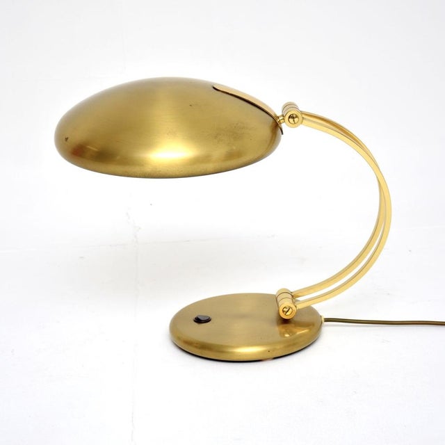 A very stylish and extremely well made vintage Bauhaus brass desk lamp by Egon Hillebrand. This was made in Germany, it...